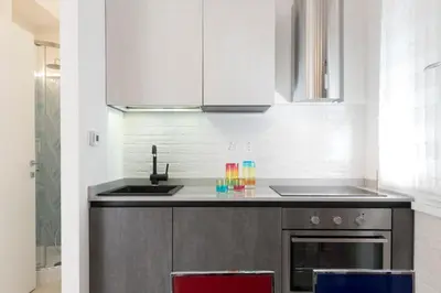 a kitchen with a sink and a counter top at St.Peter's Eden in Rome