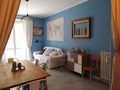 a living room with a couch and a table at Interno Otto in Rome