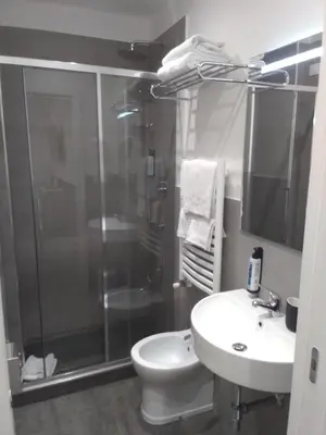 a bathroom with a sink and a mirror at ASTORIA GOLDEN GATE in Rome