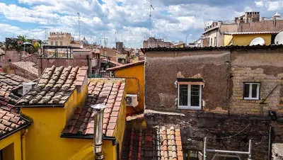 an overhead view of roofs of buildings in a city at Campo24roma Guesthouse in Rome