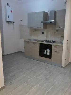 a kitchen with a stove and a counter top at MCM in Rome