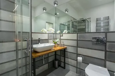 a bathroom with a sink and a mirror at Testaccio historic house in Rome