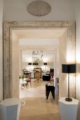 a living room with a couch and a table at Residenza B in Rome