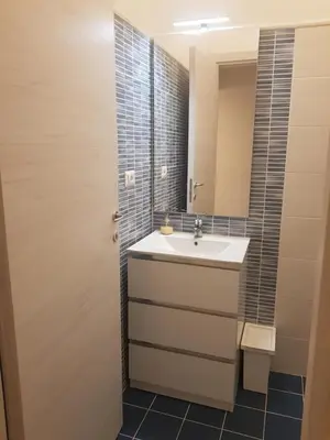 a bathroom with a sink and a mirror at Vatican Tolemaide 2 in Rome