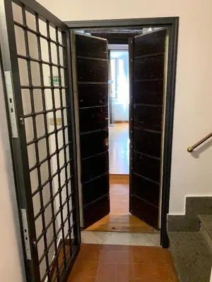 a door leading into a room with a hallway at Navona Relais - Center of Rome in Rome