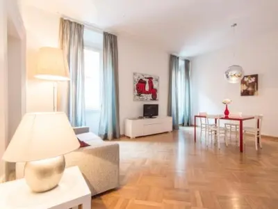 a living room with a couch and a table at Spagna Sistina 143 in Rome