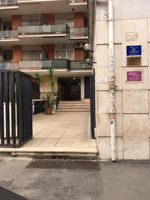an entrance to a building with a parking lot at Casa Milù in Rome