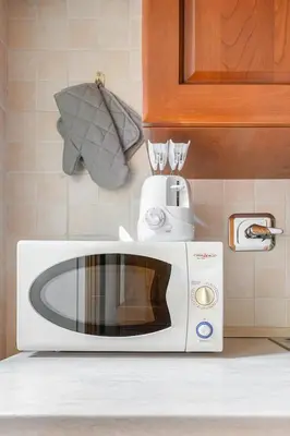 a bathroom with a washing machine and a shower at Confortevole Appartamento nel Centro Storico con 2 camere AC WiFi in Rome
