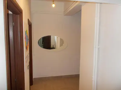 a hallway with a mirror on the wall at Milla's house rome in Rome