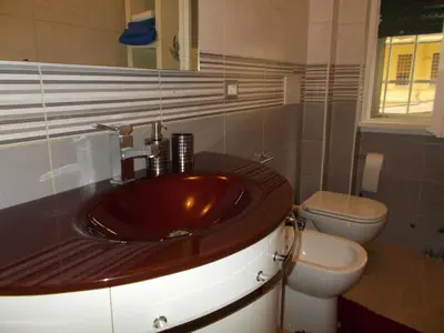 a bathroom with a sink and a toilet at Milla's house rome in Rome