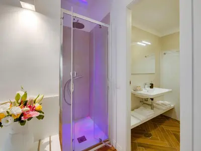 a bathroom with a shower and a sink at The Right Place - Guest House in Rome