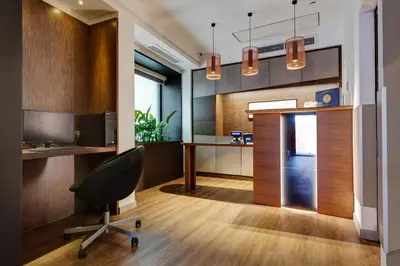 an office with a desk and a chair at Rome Art Hotel - Gruppo Trevi Hotels in Rome
