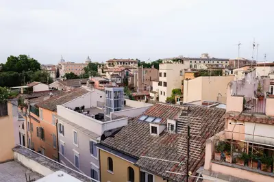 an aerial view of a city with buildings at Domus Titiana Amazing Apartment in Trastevere in Rome