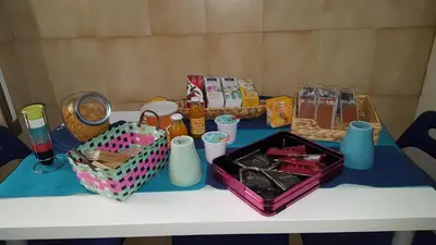 a table with food and other items on it at Uso Turistico vicino San Giovanni in Rome
