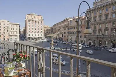 a view of a city street with cars and buildings at Luxury barberini boutique Apartment in Rome