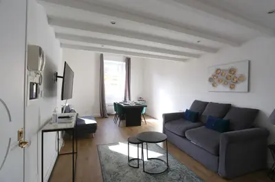 a living room with a couch and a table at Loft 5c - Palatino in Rome