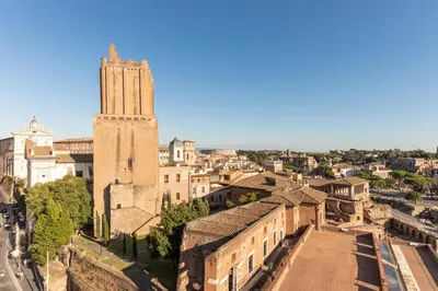 an aerial view of a city with a clock tower at The Great View in Rome