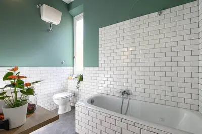 a bathroom with a white tub and a toilet at GLAM 50 - Exlusive Penthouse in the Heart of Rome in Rome