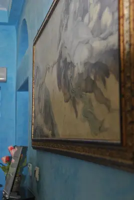 a painting of a horse hanging on a wall at Hotel Mimosa Pantheon in Rome