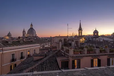 a view of a city skyline with a clock tower at Antica Dimora Delle Cinque Lune in Rome