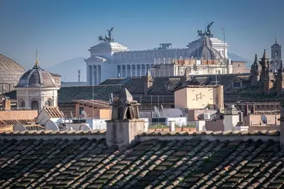 a view of a city from the roof of a building at Antica Dimora Delle Cinque Lune in Rome
