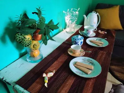a wooden table with plates of food on top of it at Relais Villa Fiorelli in Rome