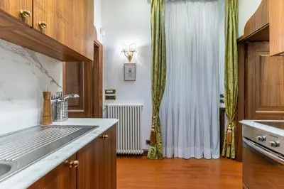 a pair of blue doors on a building at Pantheon Antique Suite in Rome