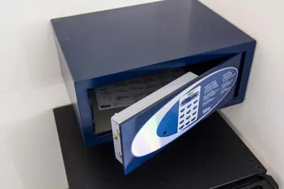 a small blue box with a remote control in it at Casa Argileto in Rome