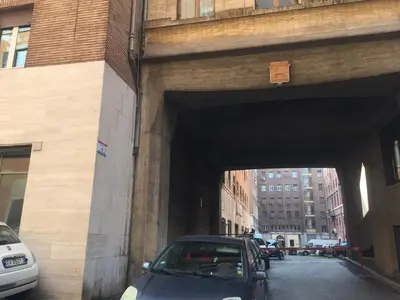 a car parked under a tunnel in a city at Regola Suite in Rome