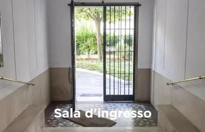 a door with a gate in a building at Easylife in Rome