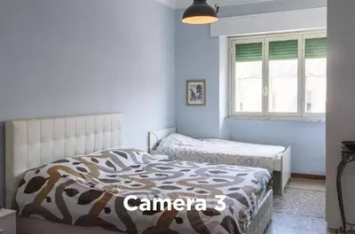 a bedroom with a bed and a window at Easylife in Rome
