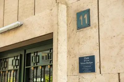 a building with a sign that says on it at Ziani Vatican Boutique in Rome