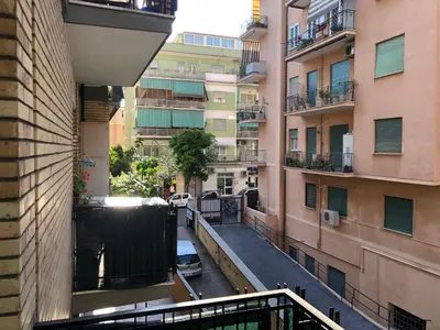 a view of an alley between two buildings at The Royals in Rome