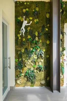 a wall with a painting of a person riding a horse at Demetra Eco Guest House in Rome