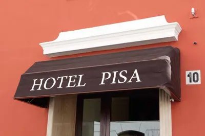 a hotel pisa sign on the front of a building at Hotel Pisa in Rome
