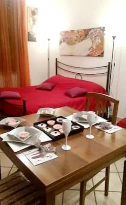 a city street at night with a large building at Comfortable studio in Rome 40.2 m² with wifi in Rome