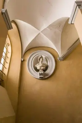 a wall with a picture of a woman on a wall at Royal Piazza di Spagna in Rome
