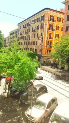 a group of cars parked in a parking lot at Novaroma by Local Domus in Rome