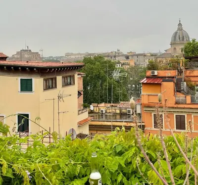 a view of a city with buildings at Sant’Onofrio - Trastevere Vatican apartment Roma in Rome