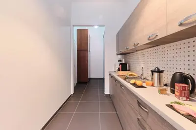 a bedroom with a dresser with a mirror and a bed at Colosseo-Trevi Iconic & Central for 2 ensuite Wi Fi AC in Rome