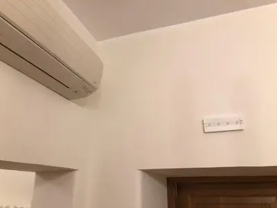a room with a ceiling with a lightswitch on the wall at Visione Via Sant’Andrea delle Fratte, 36 in Rome
