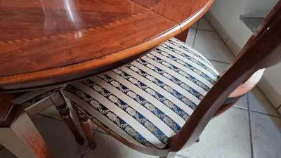 a wooden table with a chair under a table at Studio della Pace, Classy & Charming - RENOVATED in Rome