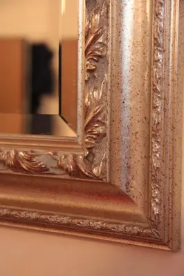 an ornate gold mirror on a wall at Studio della Pace, Classy & Charming - RENOVATED in Rome