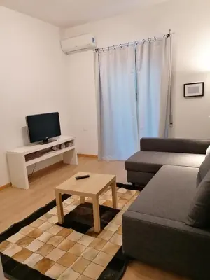 a living room with a couch and a coffee table at Chroma Italy - Doctor House in Rome