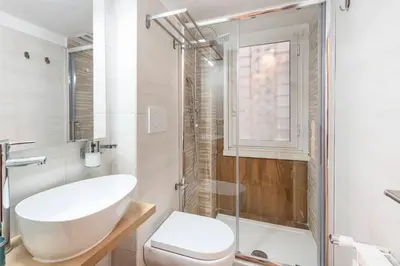 a bathroom with a sink and a toilet and a shower at B&B Il Dogandiere in Rome