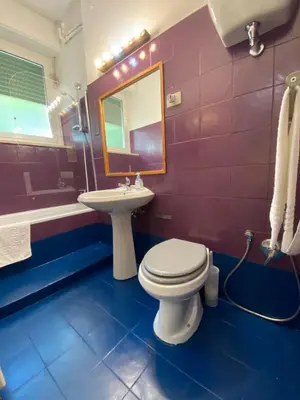 a bathroom with a toilet and a sink at Suite Marilyn - Flaminio - Olimpico - Auditorium in Rome