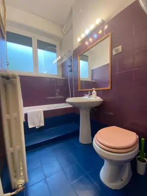 a bathroom with a toilet and a sink at Suite Marilyn - Flaminio - Olimpico - Auditorium in Rome