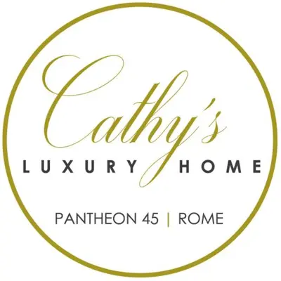 a gold circle frame with a hello kitty home logo at Cathy's Luxury Home in Rome