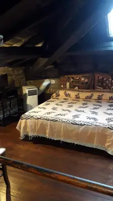 a bedroom with a bed in an attic at B&BGarbatella in Rome