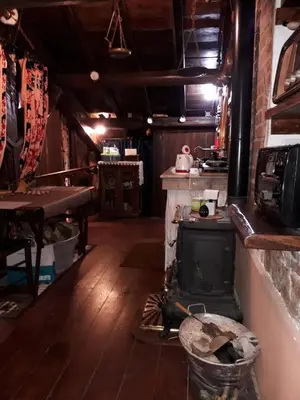 a kitchen with an old stove in a room at B&BGarbatella in Rome